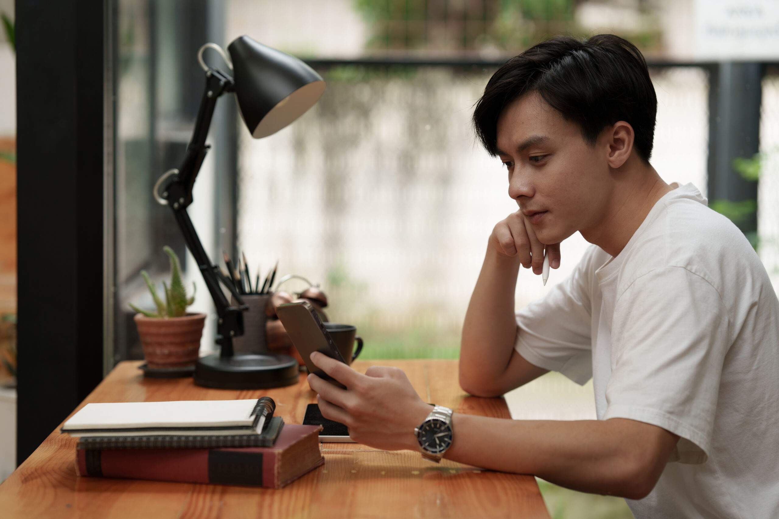 Businessman trading and analysis on smartphone. Planning and strategy on Stock market